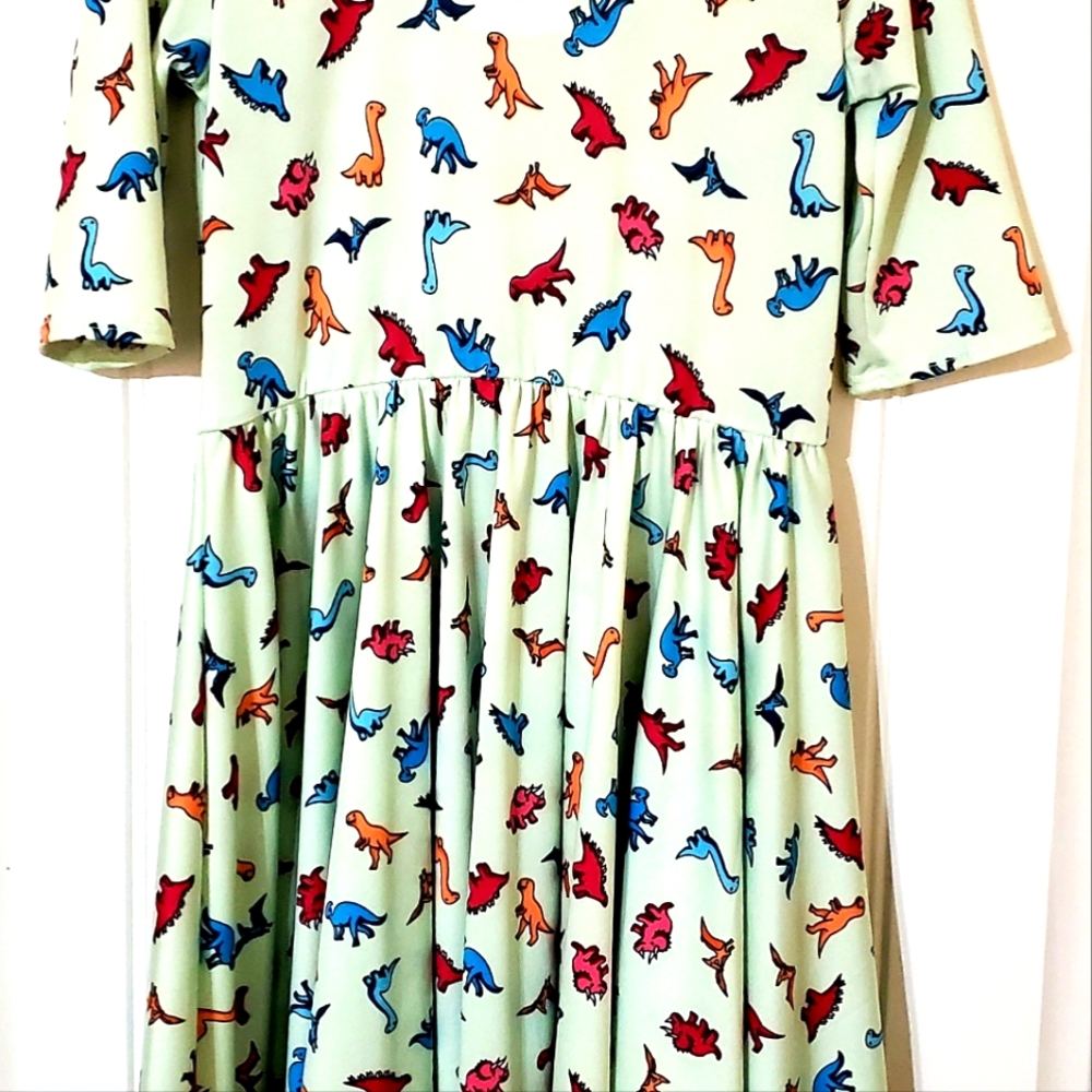 Size 7 Dot Dot Smile Dinosaur dress. Pet and smoke free home.
